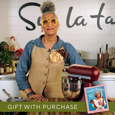 Carla Hall with KitchenAid Mixer in Sur la table kitchen