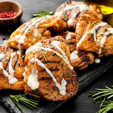 Grilled Chicken Thighs with Alabama White Sauce