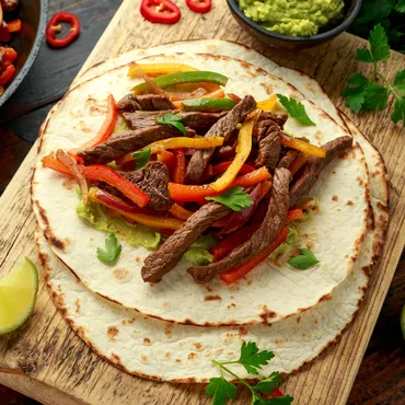 Carne Asada Fajitas with Peppers and Onions