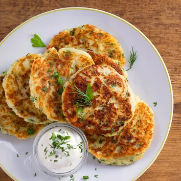 Cauliflower and Feta Fritters with Spicy Yogurt Sauce